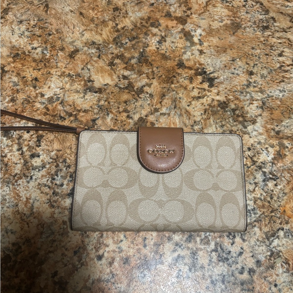 Coach Brown and Tan Signature Clutch